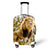 Suitcase cover lion facing the savannah