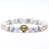 bracelet lion's head in gold with white pearls