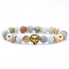 bracelet lion's head in gold with tarnished effect pearls