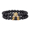 bracelet of rough black beads with lion head and crown