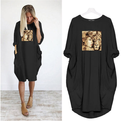 dress lion and woman's face on black background with gold flocking